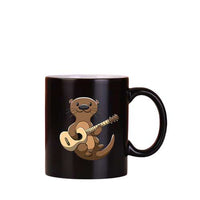 Mug magique thermosensible loutre guitariste - Petite Loutre