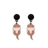 Boucle d'oreille petite loutre à collectionné