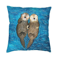 Housse de coussin couple de petite loutre